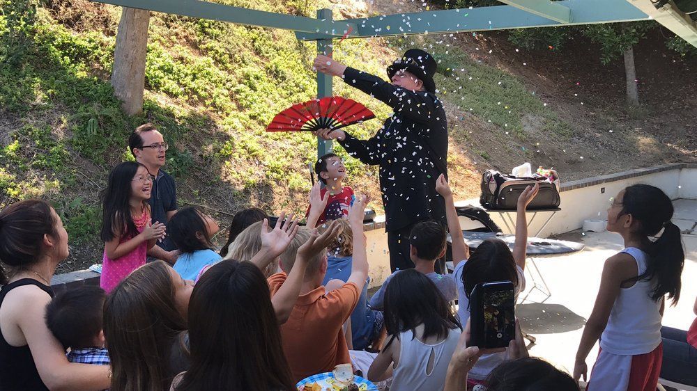 A magician by The Balloon Guy.