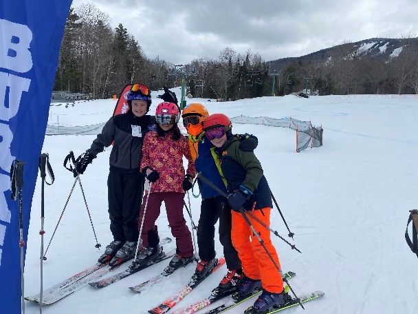 Group of kids skiing