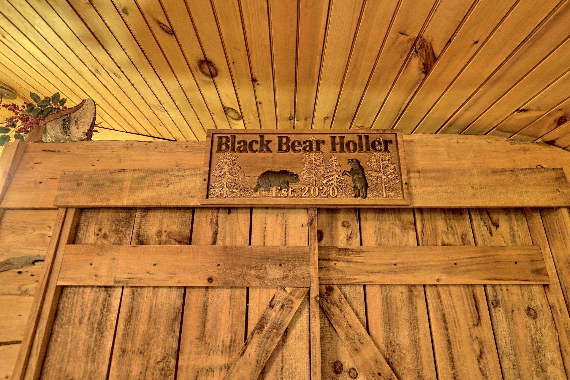 Image of the rental cabin name sign 