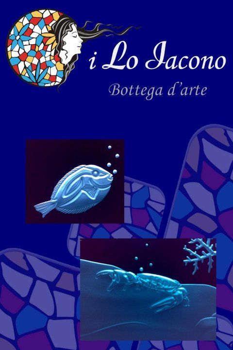 vetrate a tema marino con pesci incisi