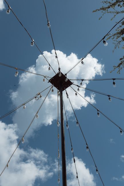 Minimalist string lights arranged in a network pattern representing AI citation visibility