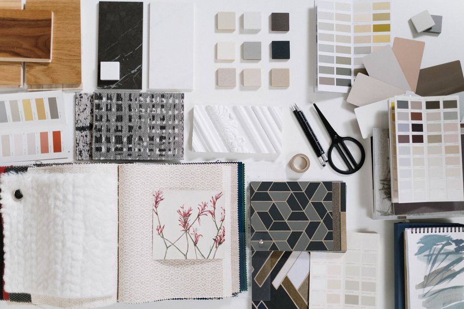 Flat lay of web design materials representing counselor website strategy