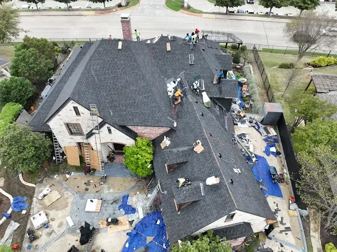 An aerial view of a house that is being remodeled.
