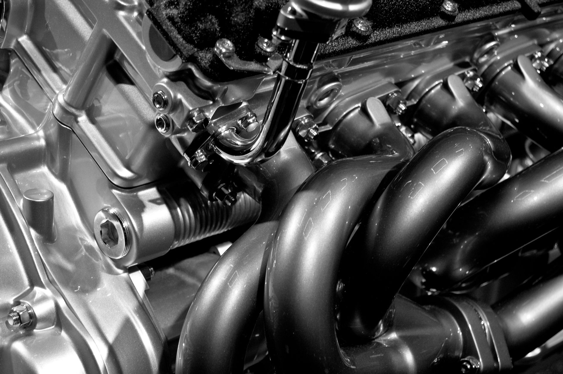 A black and white photo of a motorcycle engine.
