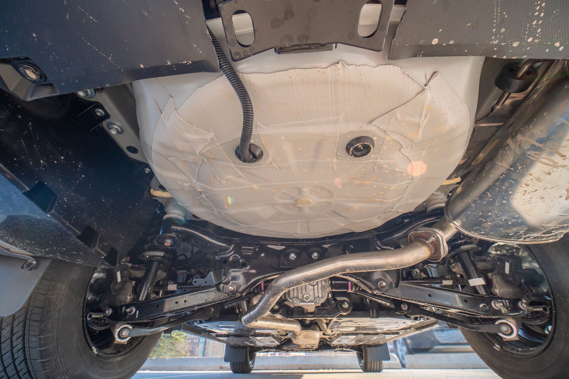 A close up of the underside of a car.