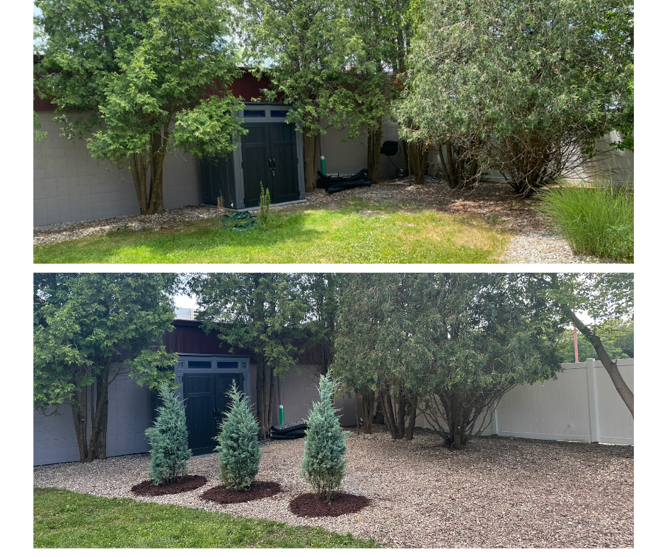 Commercial stone landscape bed install in Okemos, MI with tree plantings