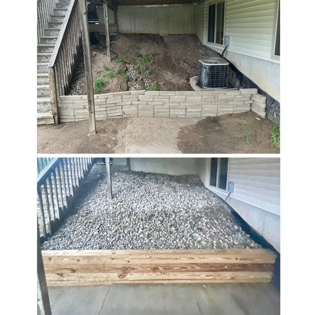 Under-deck retaining wall with gravel drainage stone installed for improved water management and erosion control in Okemos, Michigan