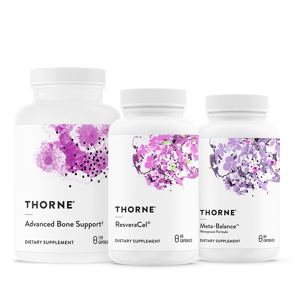 Three white supplement bottles with purple floral designs and Thorne labels.