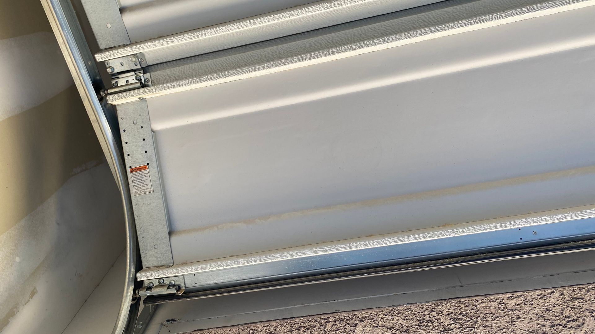 A close up of the inside of a garage door.