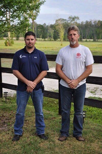 Two handsome guy — Tree Removal in Jacksonville, FL