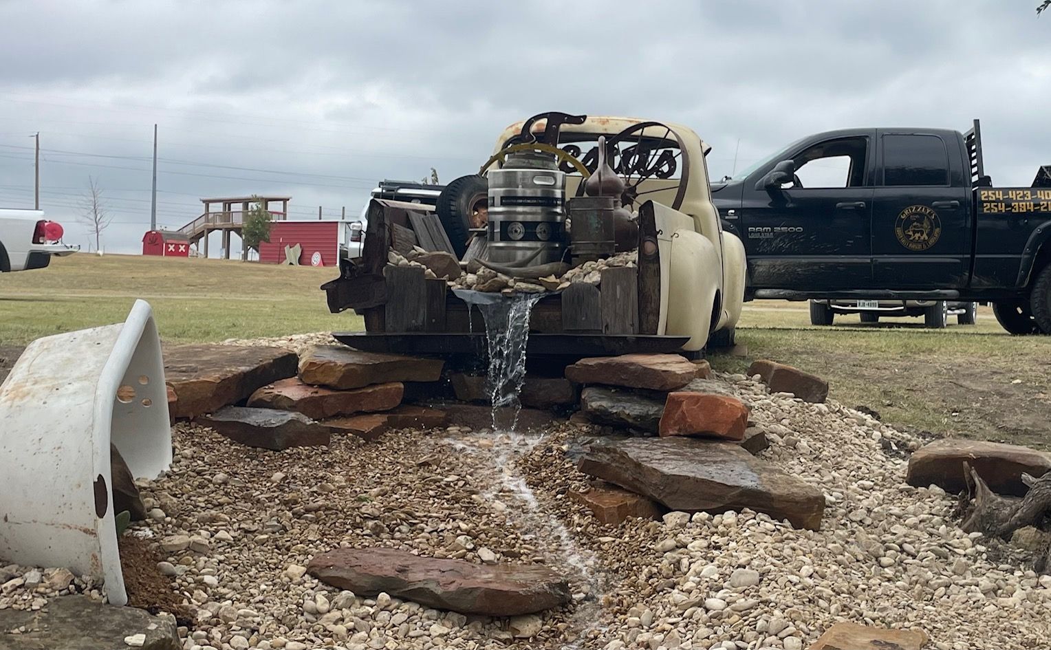 Old truck with waterfall coming from bed