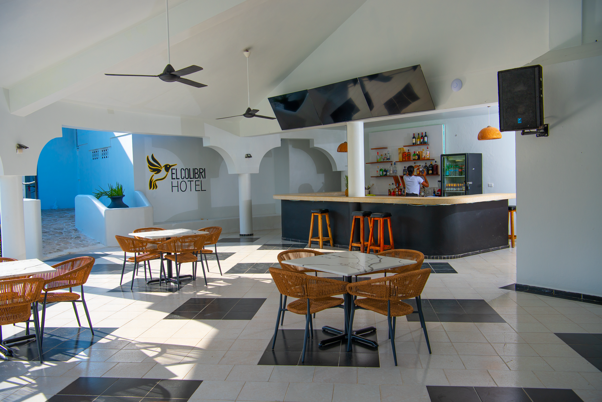 A wooden table with a plate of food on it in a restaurant.