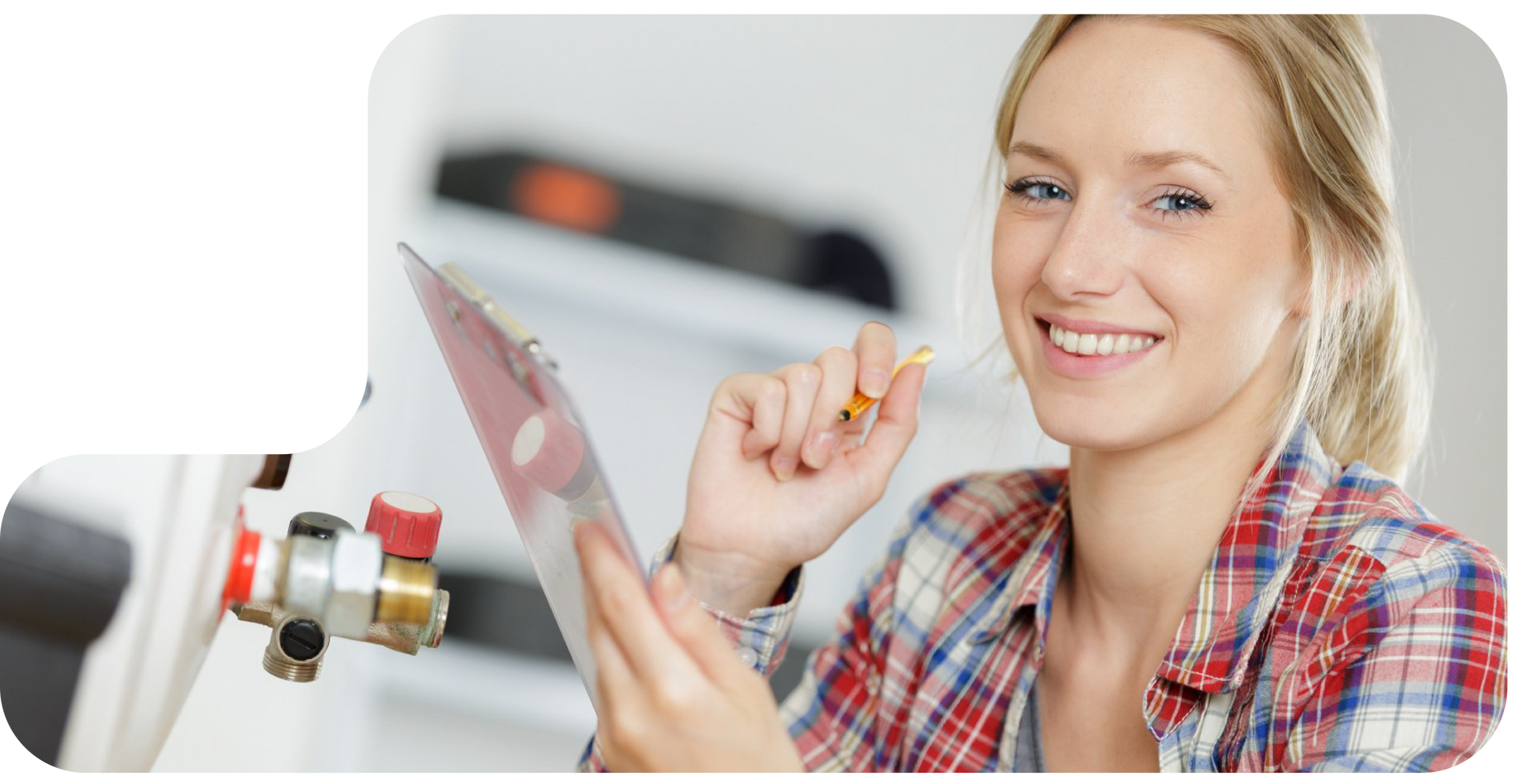 A woman is cleaning the filter of an air conditioner.