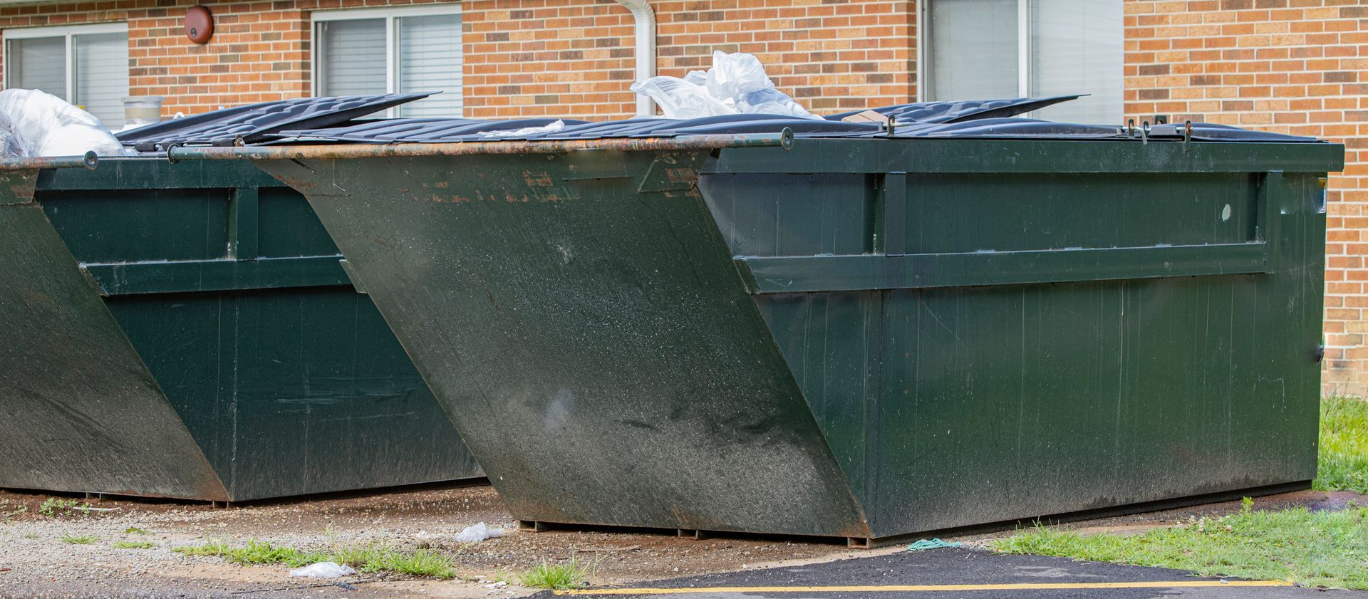 Black And Green Dumpsters — Poplar Bluff, MO — Eldridge Trash Service