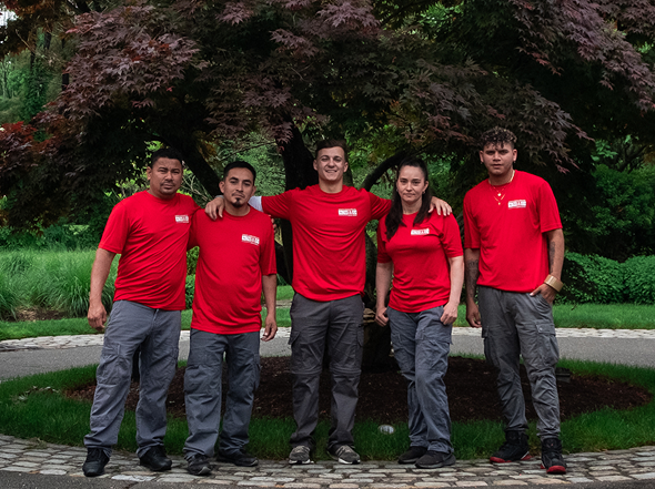 A team of professional Smooth Move & Delivery movers posing outdoors, representing our expert crew for Norwalk, CT.