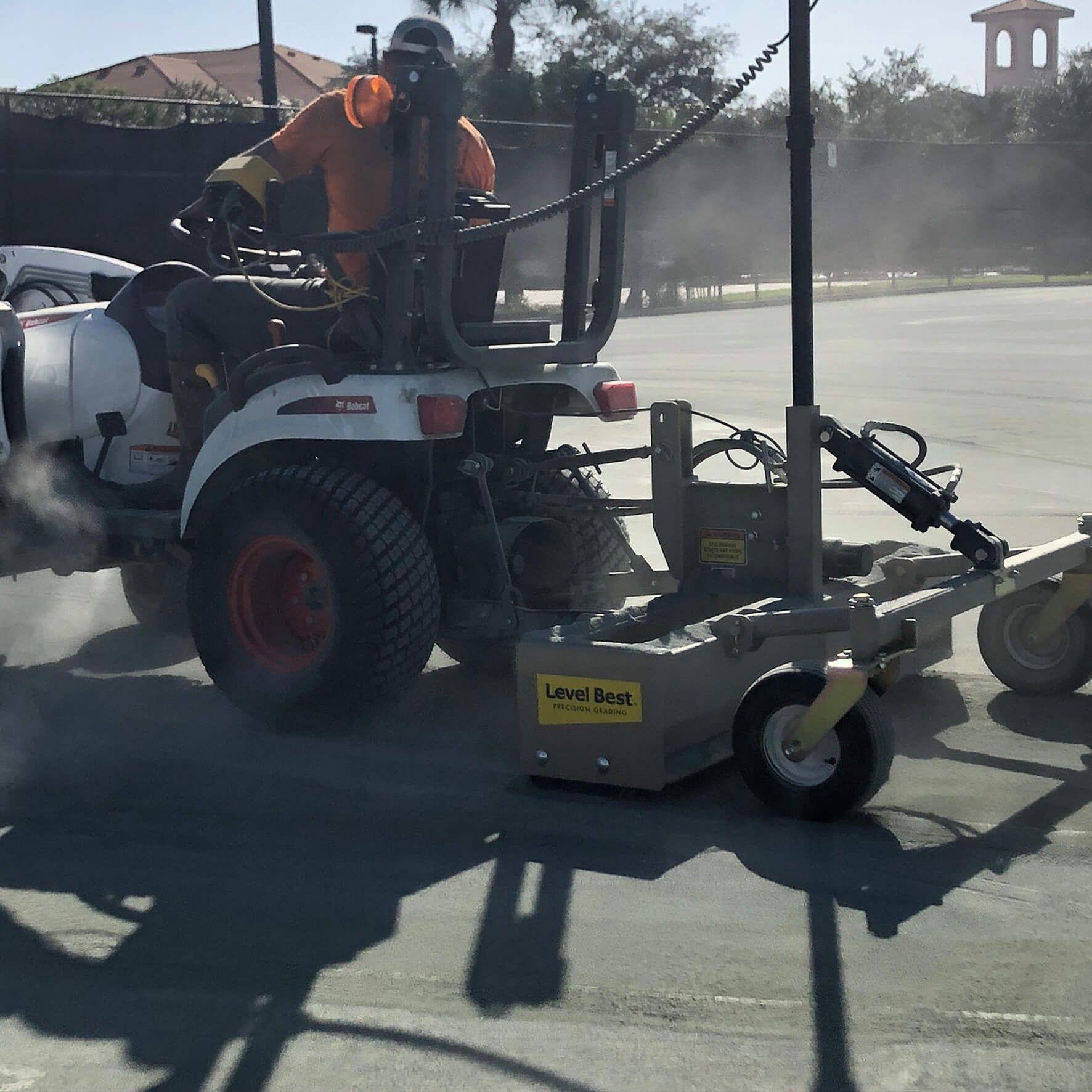 a man is driving a lawn mower with a yellow sticker on the side that says ' jeep '