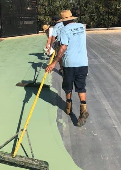 a man wearing a blue shirt that says ' a & e ' on it