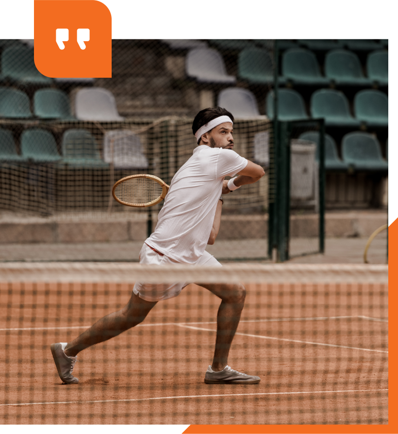 A tennis court in the middle of a forest