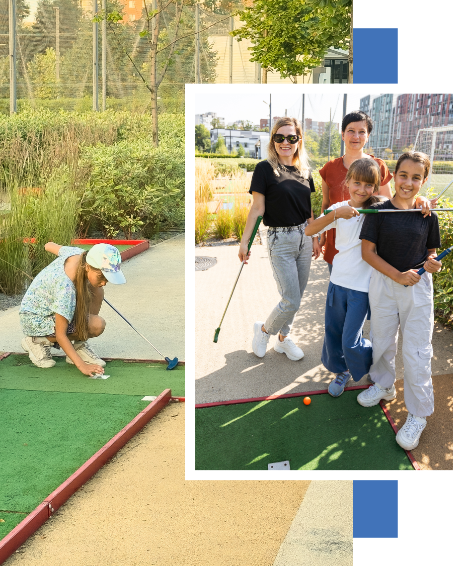 A group of people are playing a game of croquet