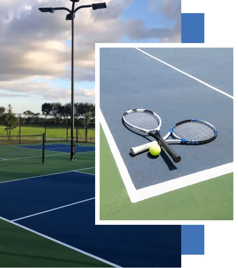 Two tennis rackets and a tennis ball on a tennis court