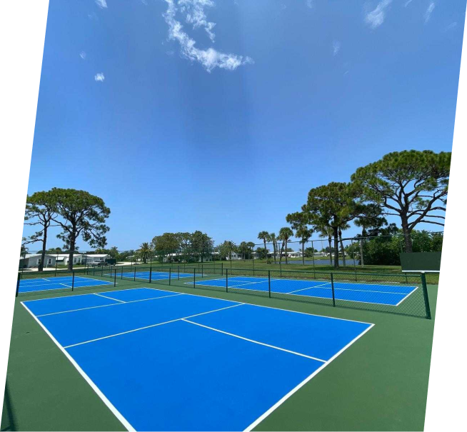 A Tennis Court with Blue and White Lines 