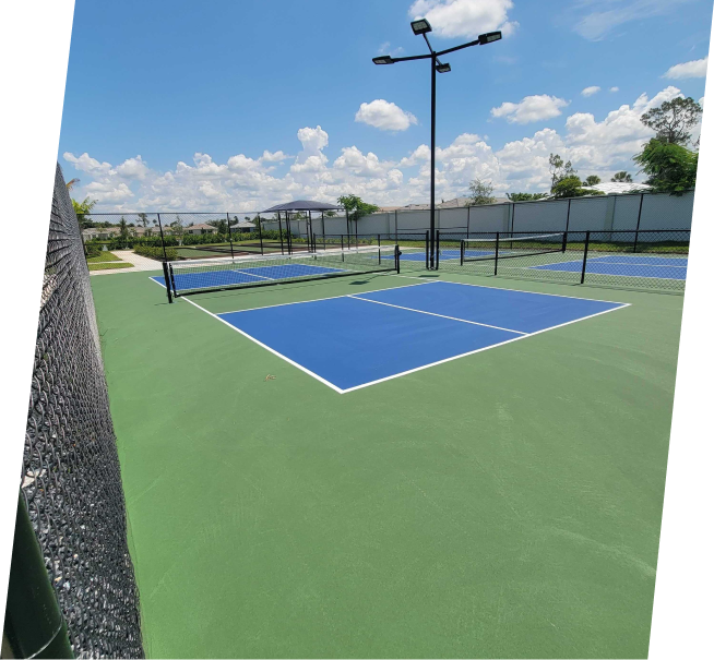 a tennis court with a blue court and a green court