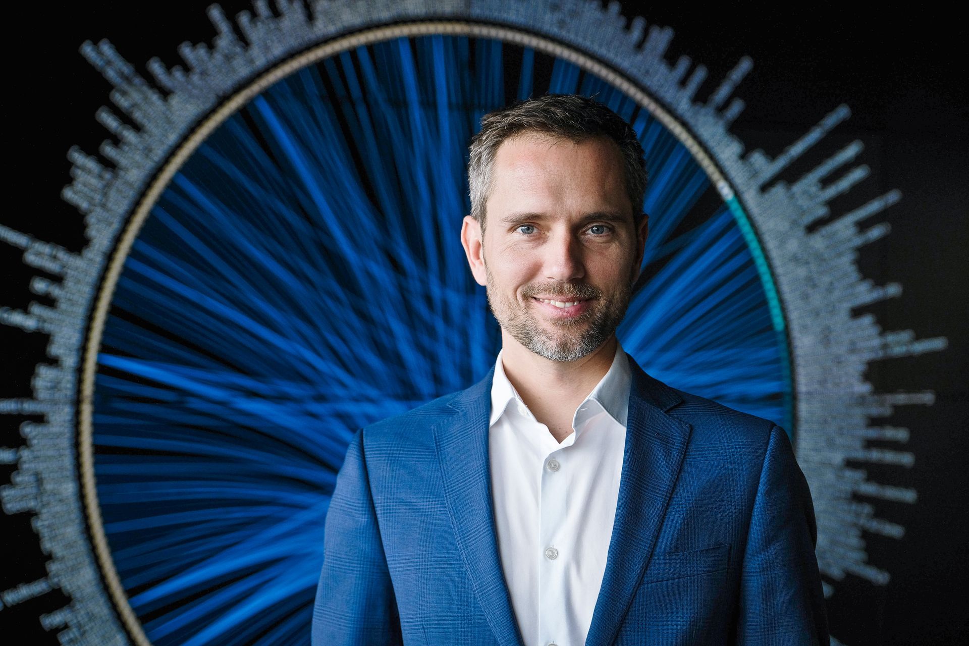 An aerial view of Schaffhausen, Switzerland with a bridge over the rhine and the Munot castle in the background.