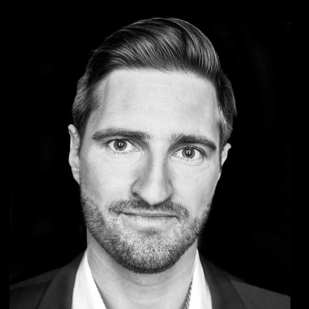 Black and white portrait of Robin Becker.