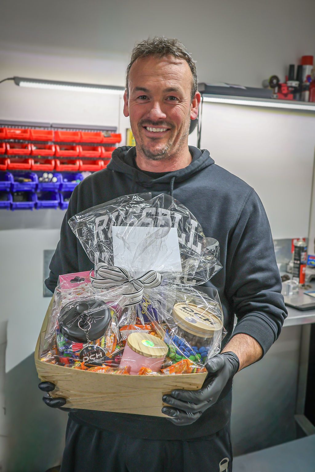 DCH mechanic explaining to a customer the faults that have been found on their car