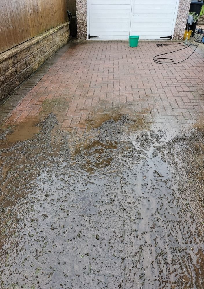 Jimmy's External Cleaning Services part way through block paving cleaning a driveway in Bradford