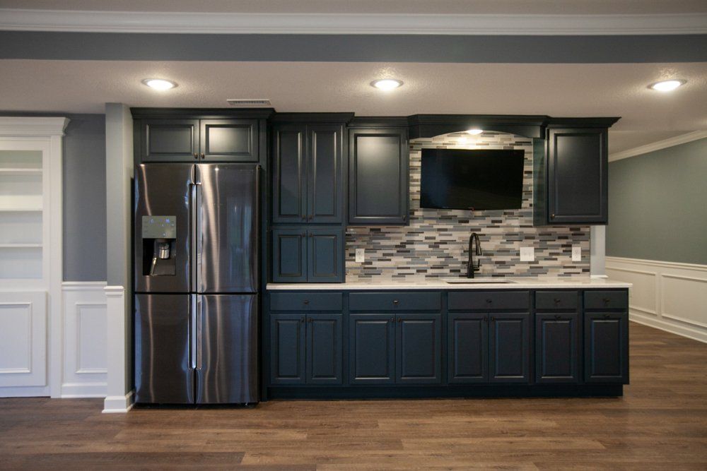 At New Beginnings Construction, we will remodel your kitchen cabinets.