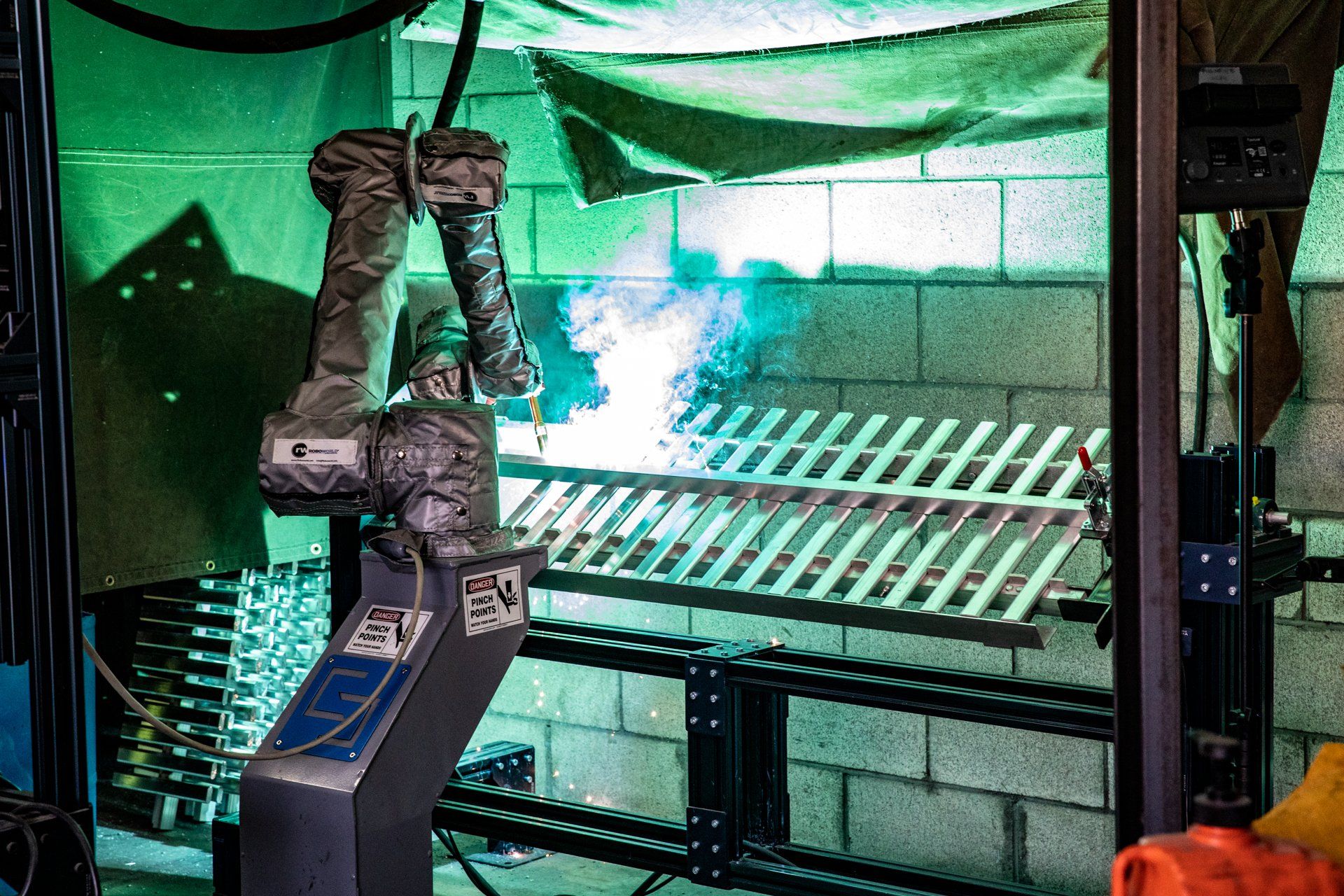 welding robot welding small pieces of metal