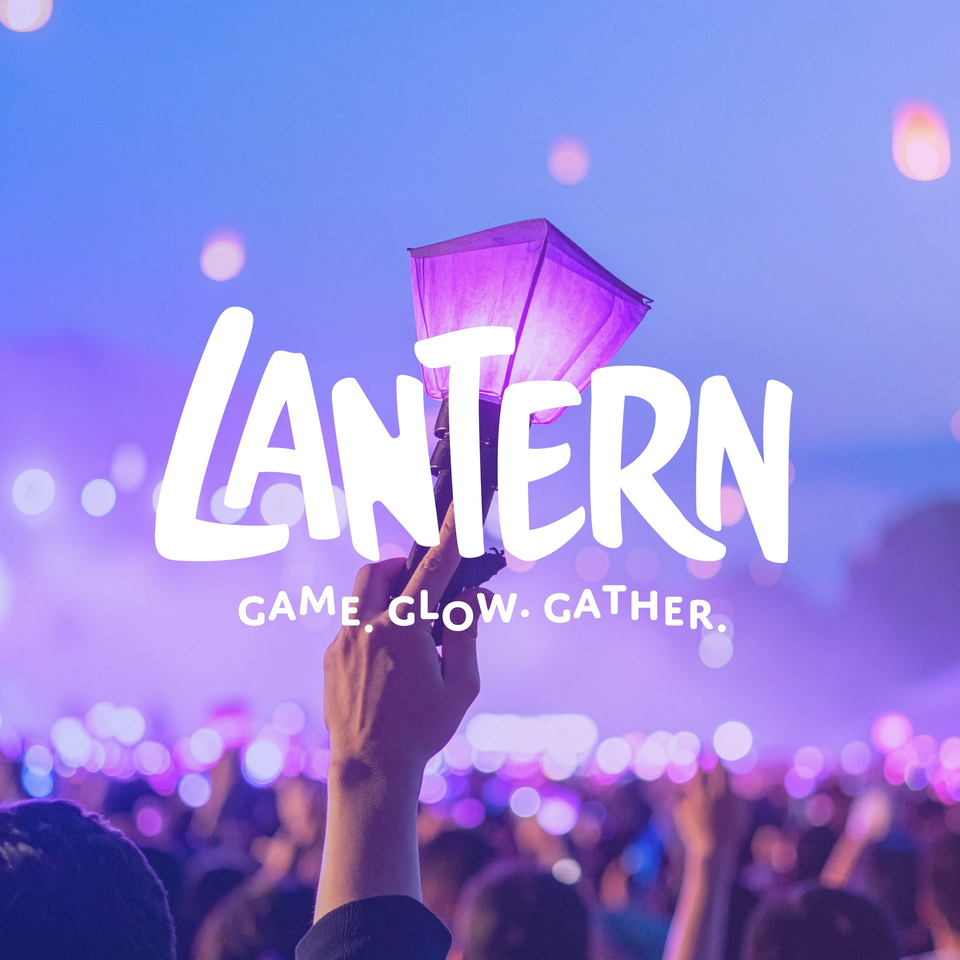 Hand holding a glowing lantern at a purple night event with “LANTERN” and “game. glow. gather.”