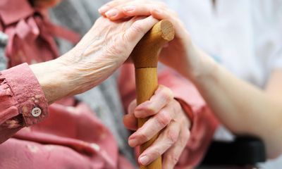 Nurse Holding Old Lady Hands — Tucumcari, NM — Helping Hands Hospice