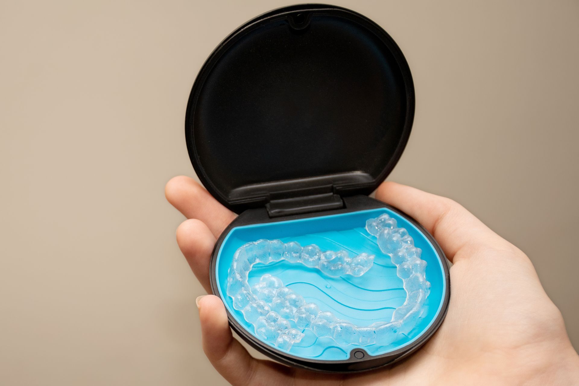 How to Clean Invisalign Trays | Cre8 Smile Studio