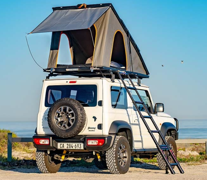 A Truck with a Tent on Top of it - Whitsunday 4x4 & Automotive In Cannonvale, QLD