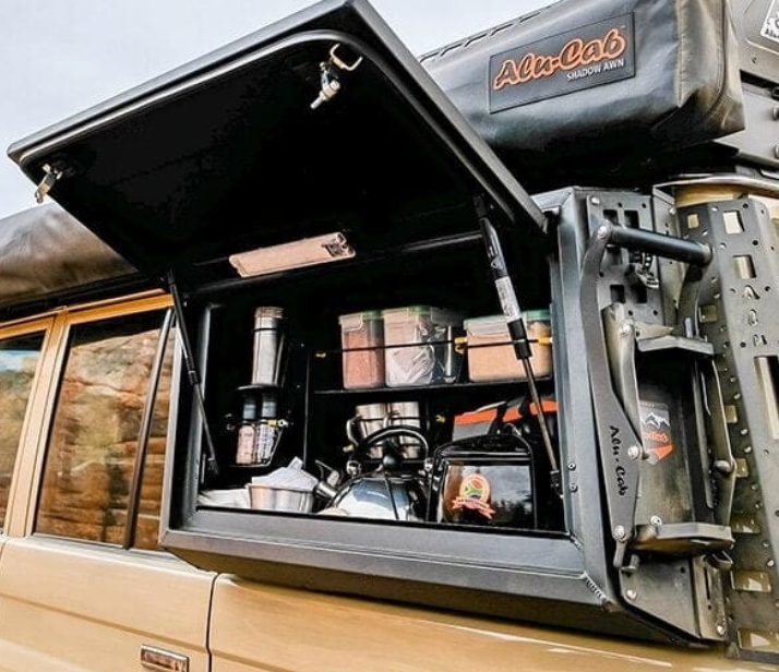 A car with the door open and the word alt cab on it