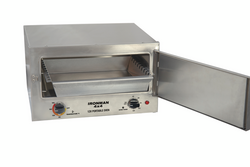 A stainless steel oven with the door open and a tray inside.
