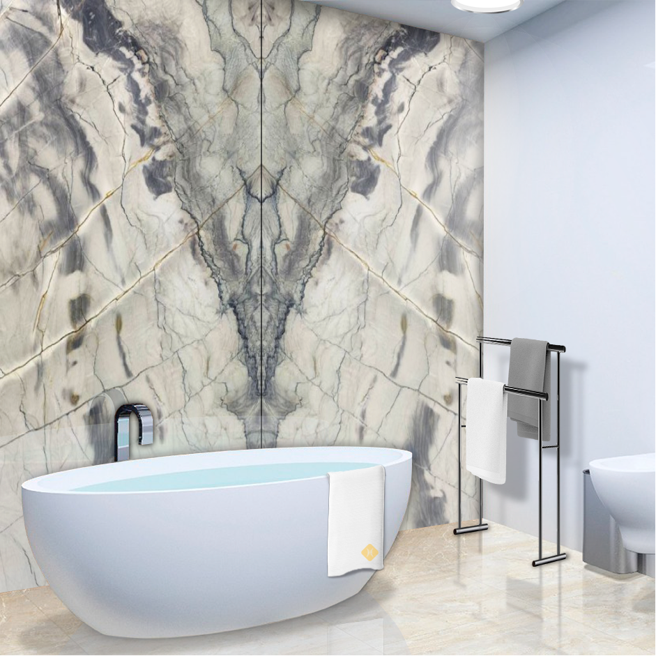 A bathroom with a bathtub and a marble wall