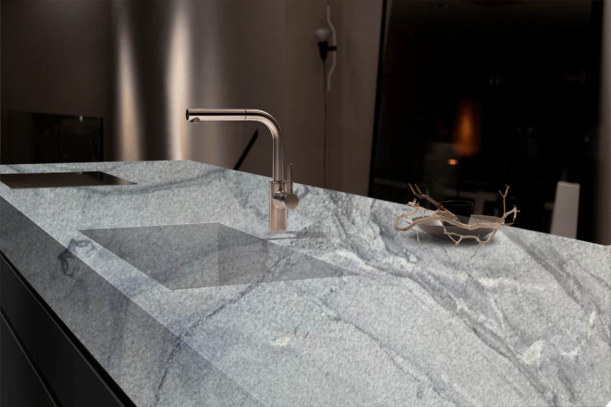 A kitchen counter with a sink and a faucet on it