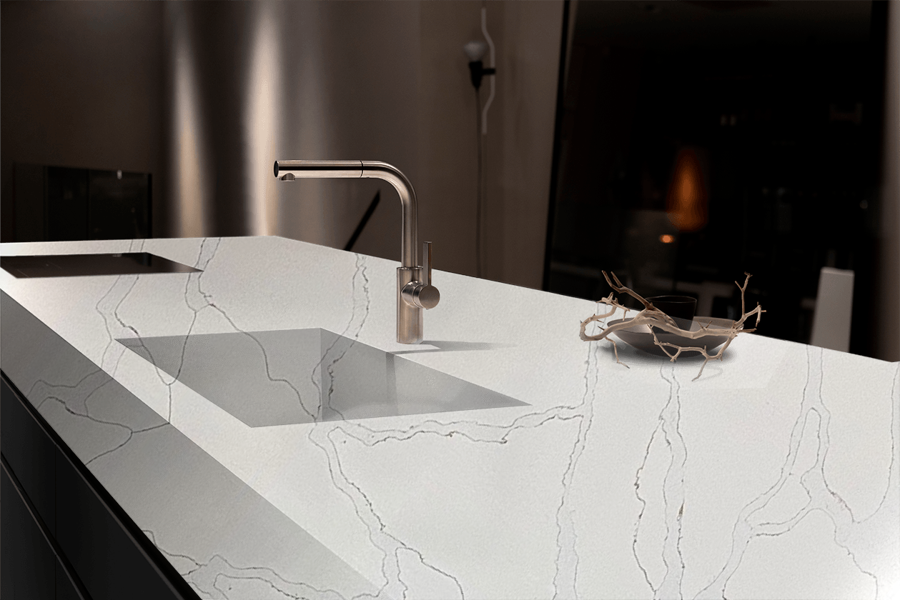 A kitchen counter with a sink and a faucet on it.