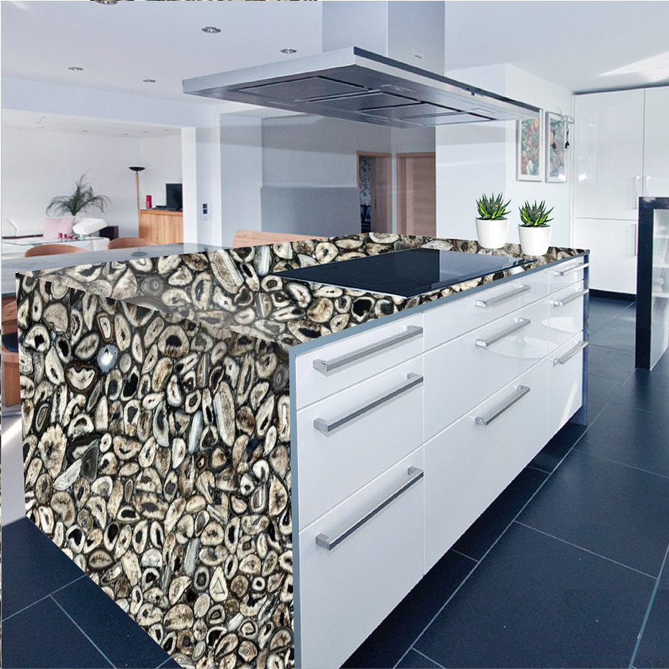 A kitchen with a large island and a stove top oven