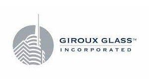 The logo for giroux glass incorporated shows a building in a circle.