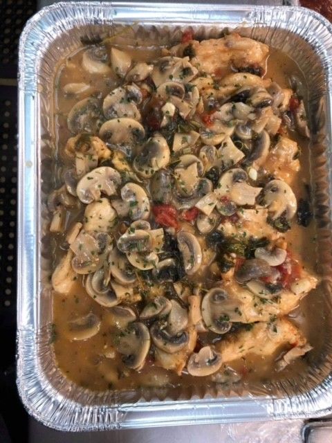 chicken marsala in tray for catering