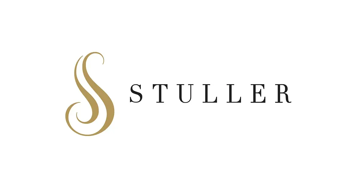 A logo for s stiller with a gold s on a white background.