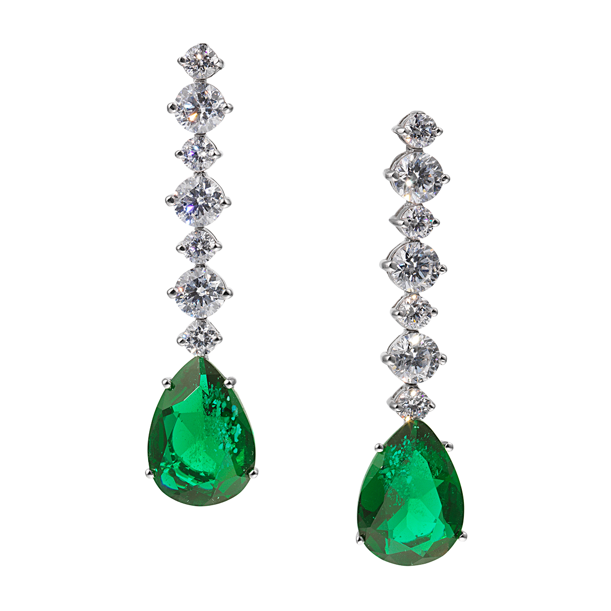 A pair of emerald and diamond earrings on a white background