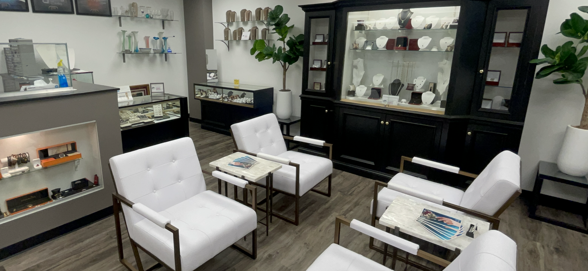 There are many chairs and tables in the room. St. Louis Gold buyers store