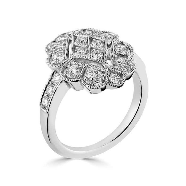 A white gold ring with diamonds on a white background