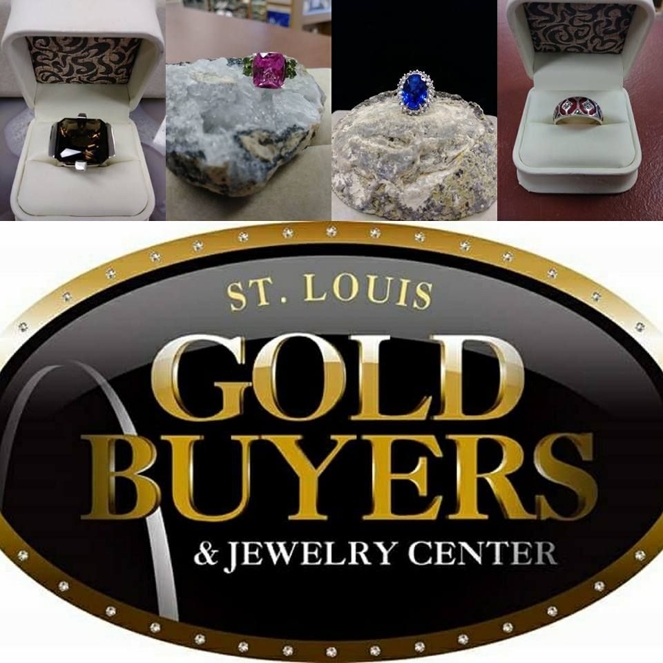 Jewelry display: rings with gemstones, logo for St. Louis Gold Buyers & Jewelry Center.