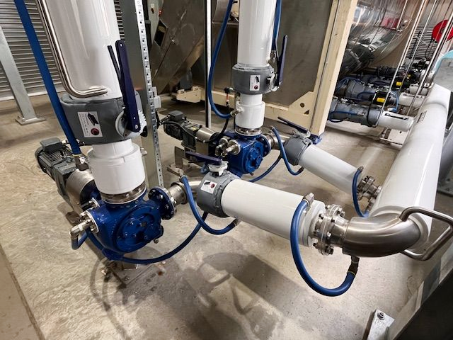 Piping system with varisco pumps, white PVC piping, Insulock Thermocovers, Insulation Blankets, Insulation Jacketing